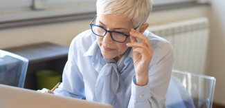 Woman looking at her computer