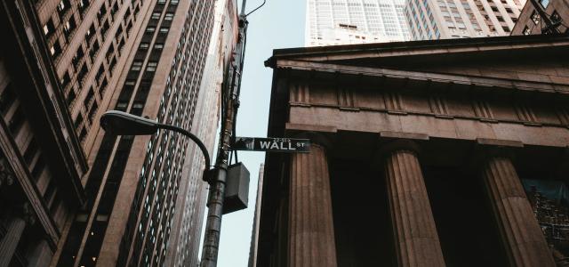 gray streetlight near building by Aditya Vyas courtesy of Unsplash.