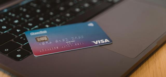 blue and white visa card on silver laptop computer by CardMapr.nl courtesy of Unsplash.